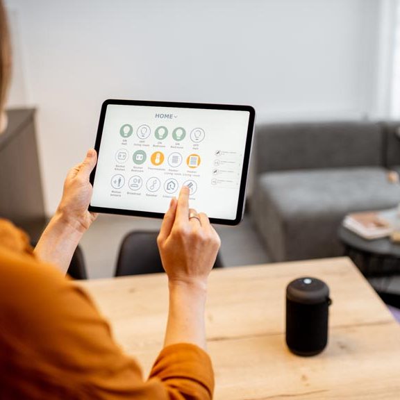 woman-controls-smart-home-devices-on-tablet-2026-01-08-22-40-06-utc